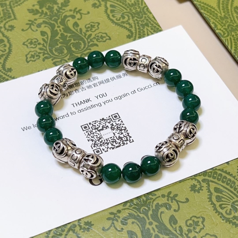 G*u*i bracelets